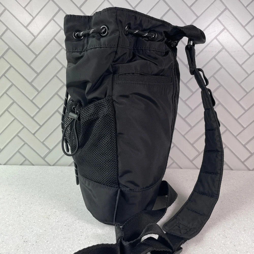 Dagne Dover Nova Sling Drawstring Crossbody Backpack Onyx Black Nylon Bucket Bag
